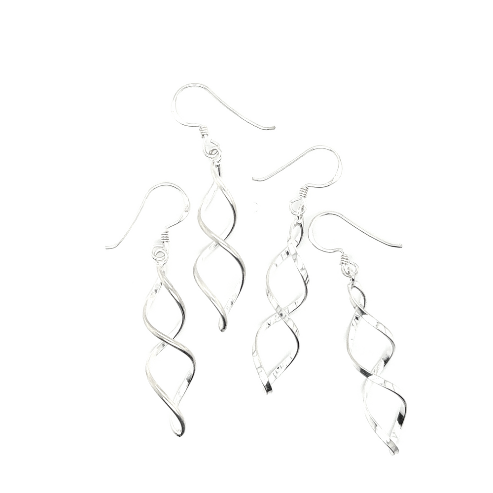 
                  
                    A pair of Delicate Twisted Earrings by Super Silver, perfect for everyday wear.
                  
                
