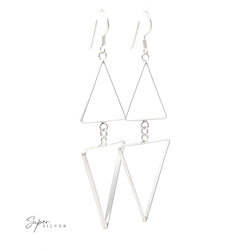 Long Modern Double Triangle Earrings meet sterling silver in this pair of triangle earrings displayed against a white background.
