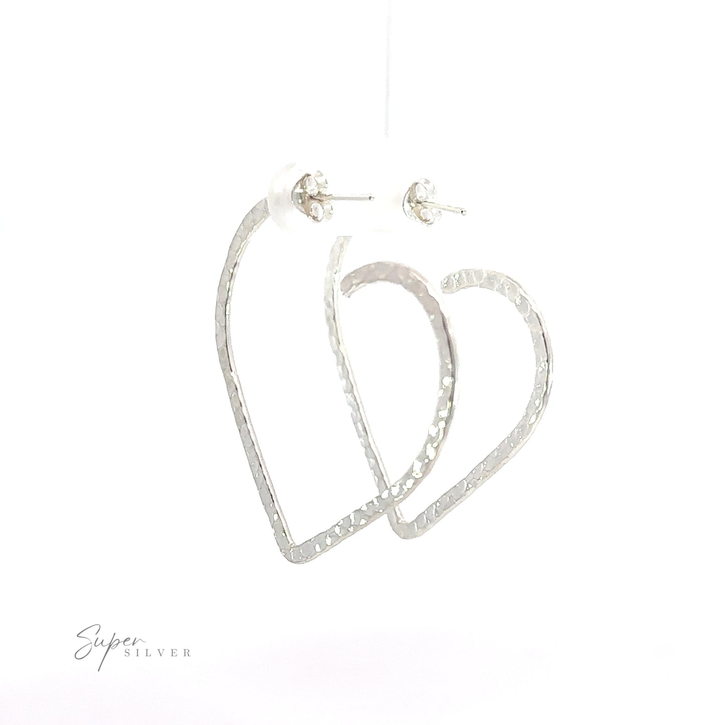 
                  
                    A pair of Textured Heart Hoop Earrings, made from .925 sterling silver, hanging on a white background.
                  
                