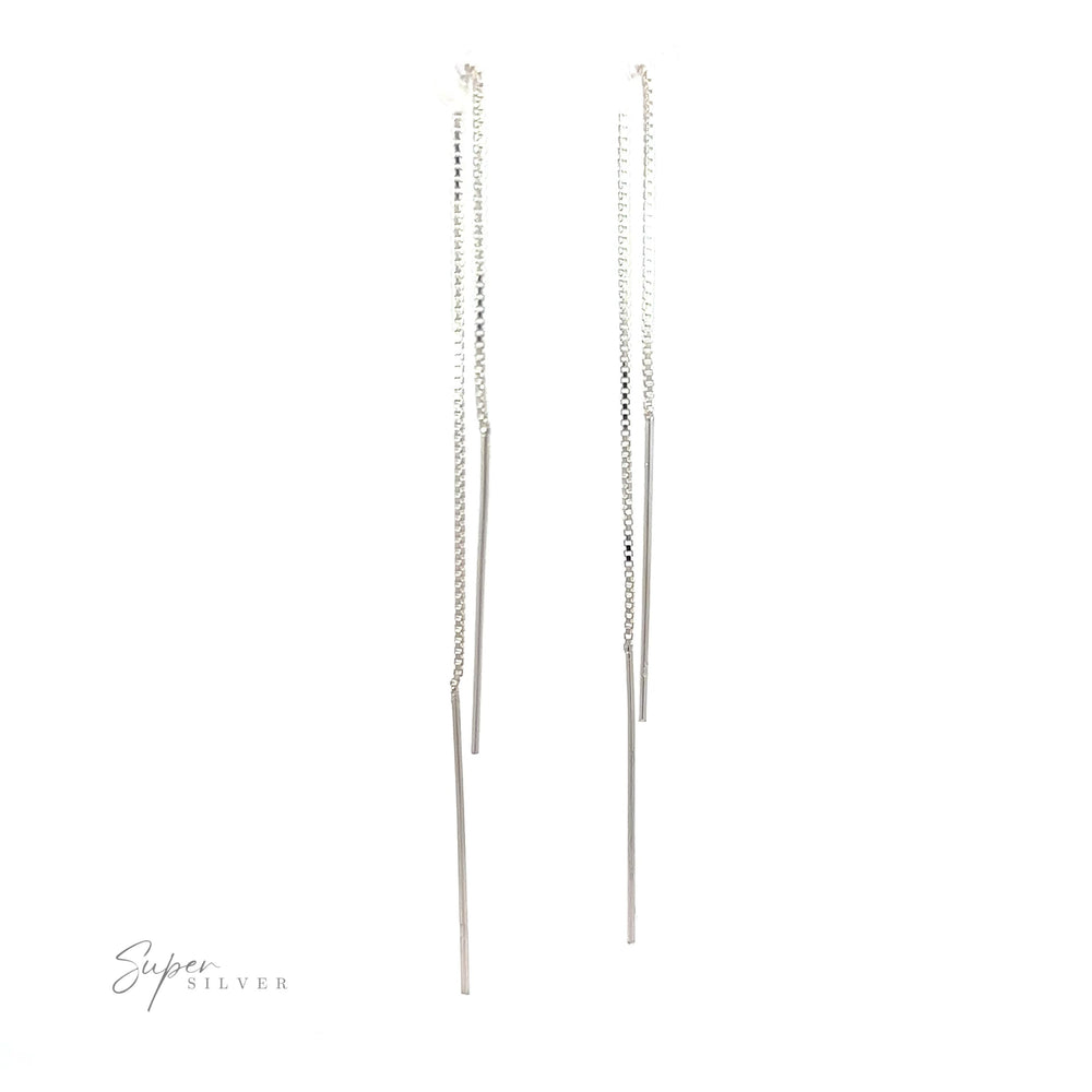 These Simple Silver Wire Threader earrings are made of sterling silver and feature a long chain for a minimalist look.