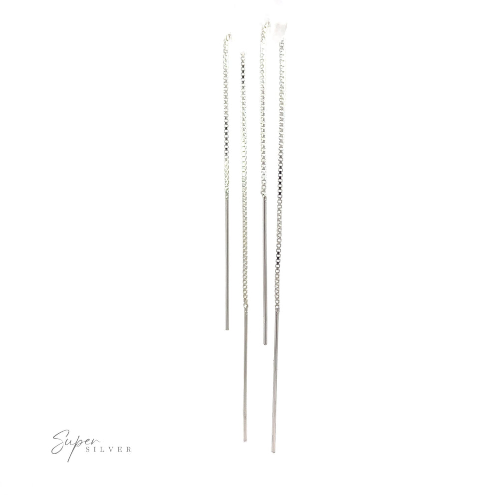 
                  
                    Three Simple Silver Wire Threader earrings on a white background.
                  
                