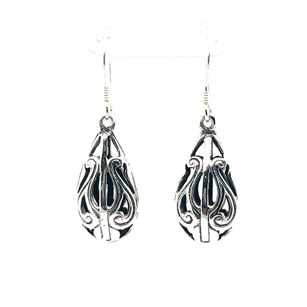 
                  
                    A pair of Super Silver Filigree Teardrop Earrings, perfect for a boho aesthetic.
                  
                