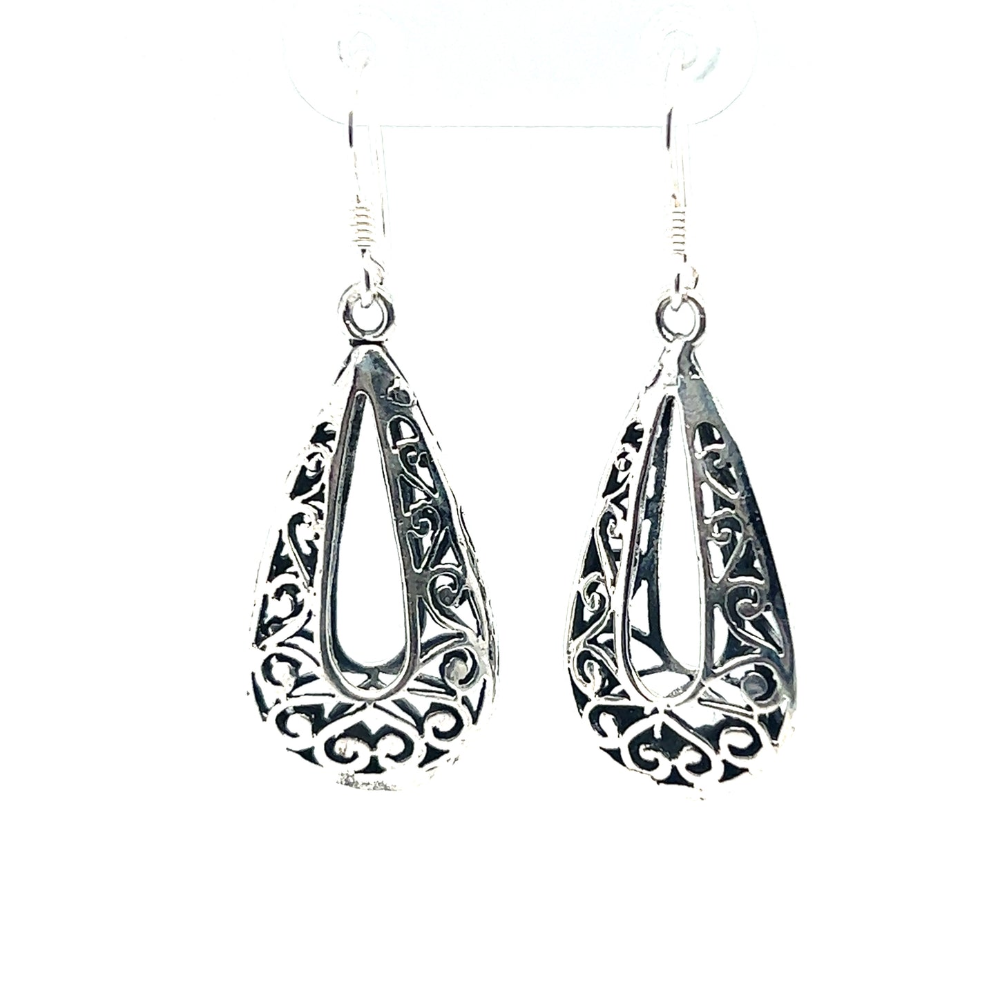 
                  
                    A pair of Super Silver Filigree Teardrop Earrings with Open Center, adding a bohemian flair to any outfit.
                  
                