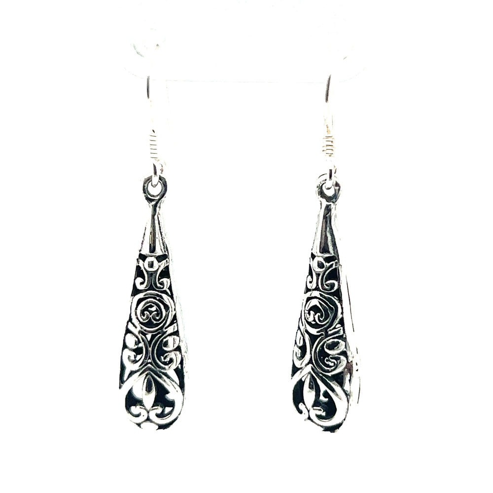 A pair of Super Silver Filigree Teardrop Earrings in sterling silver with ornate designs inspired by Bali.