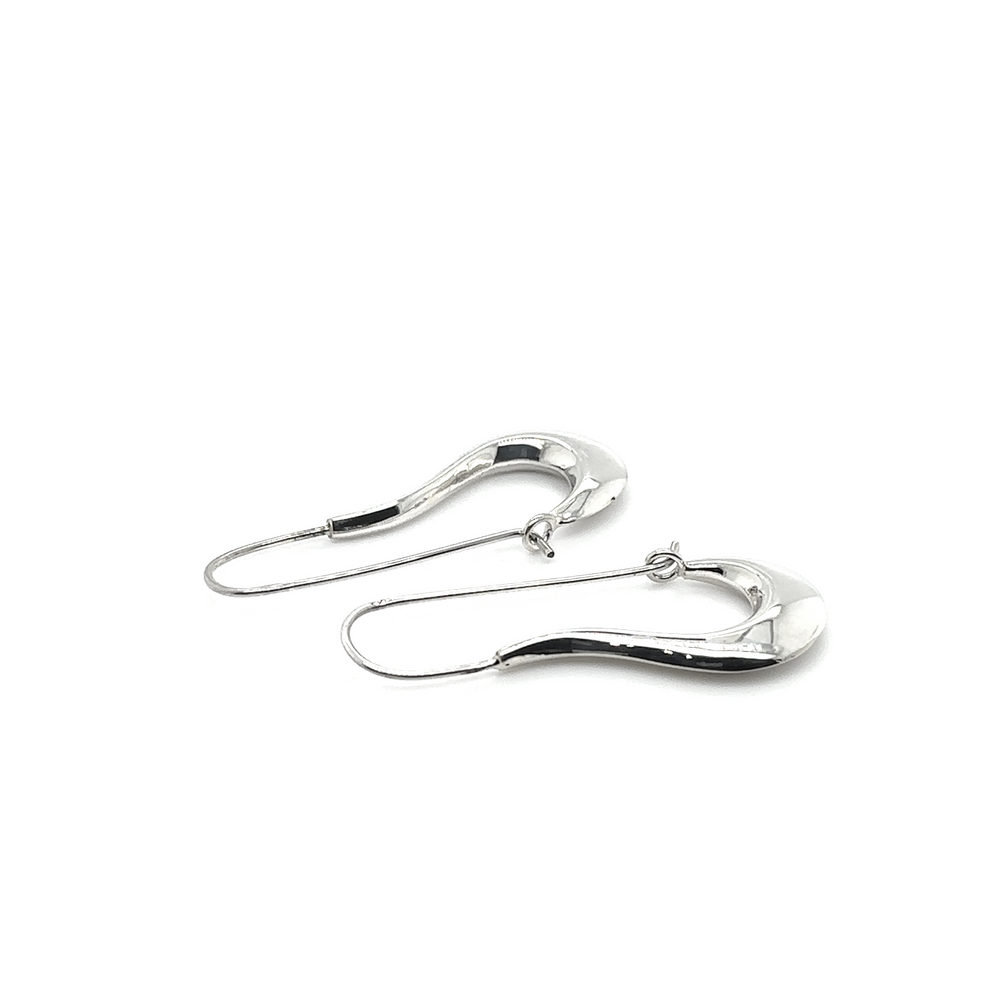 
                  
                    A pair of Curved Hoop Earrings with a smooth surface.
                  
                