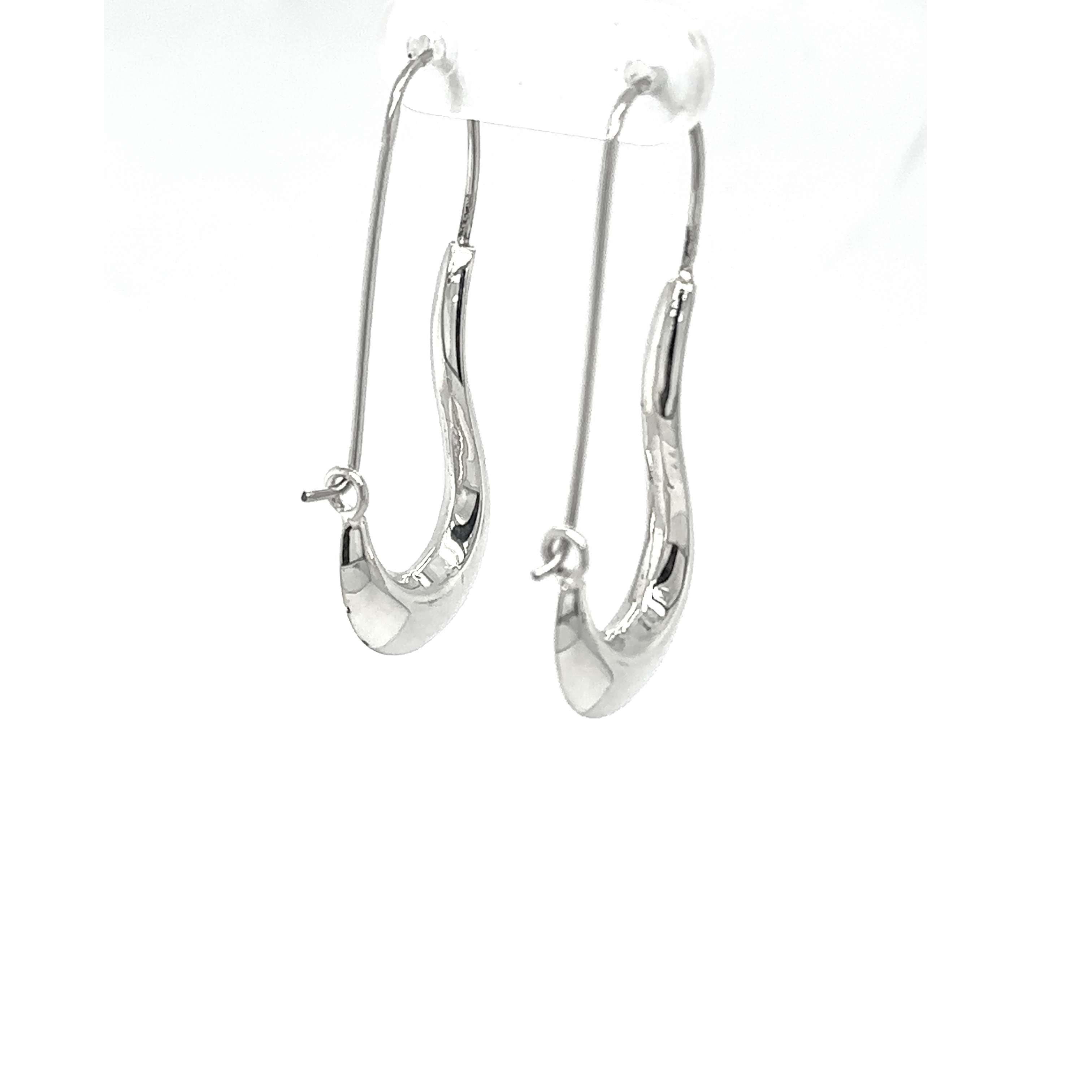 A pair of Curved Hoop Earrings on a white background.
