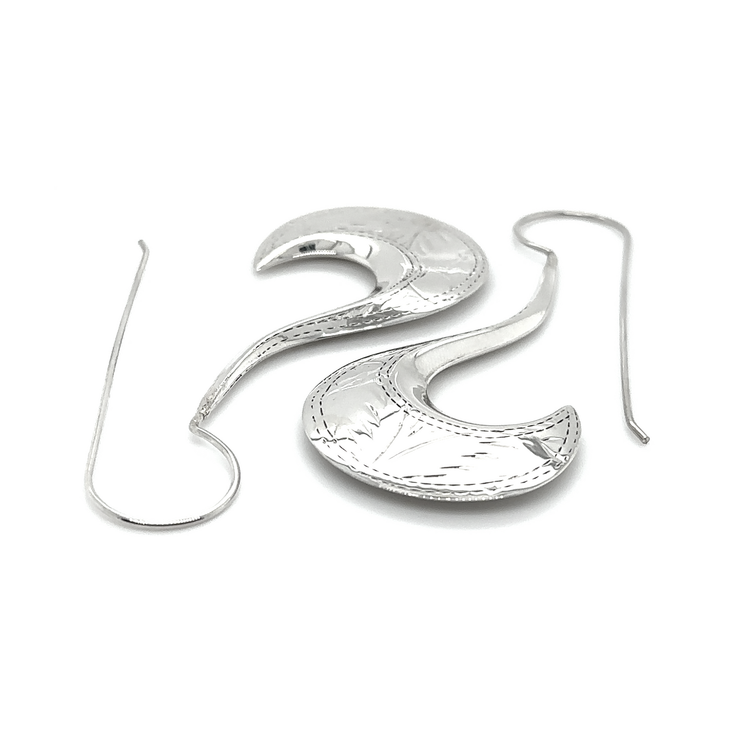 
                  
                    A pair of Super Silver Etched Victorian Style Curved Earrings with a curved shape, featuring freestyle etching.
                  
                