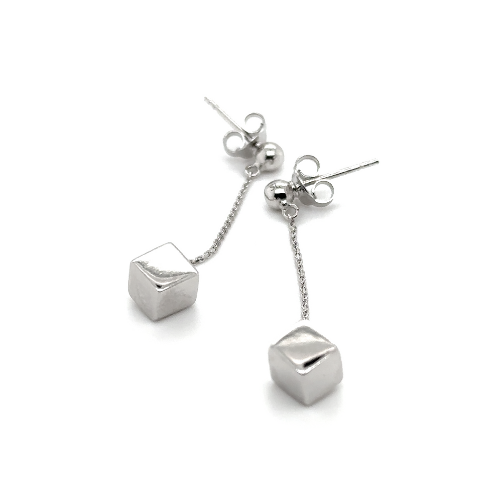 
                  
                    A pair of Super Silver sterling silver earrings with a cube shape.
                  
                