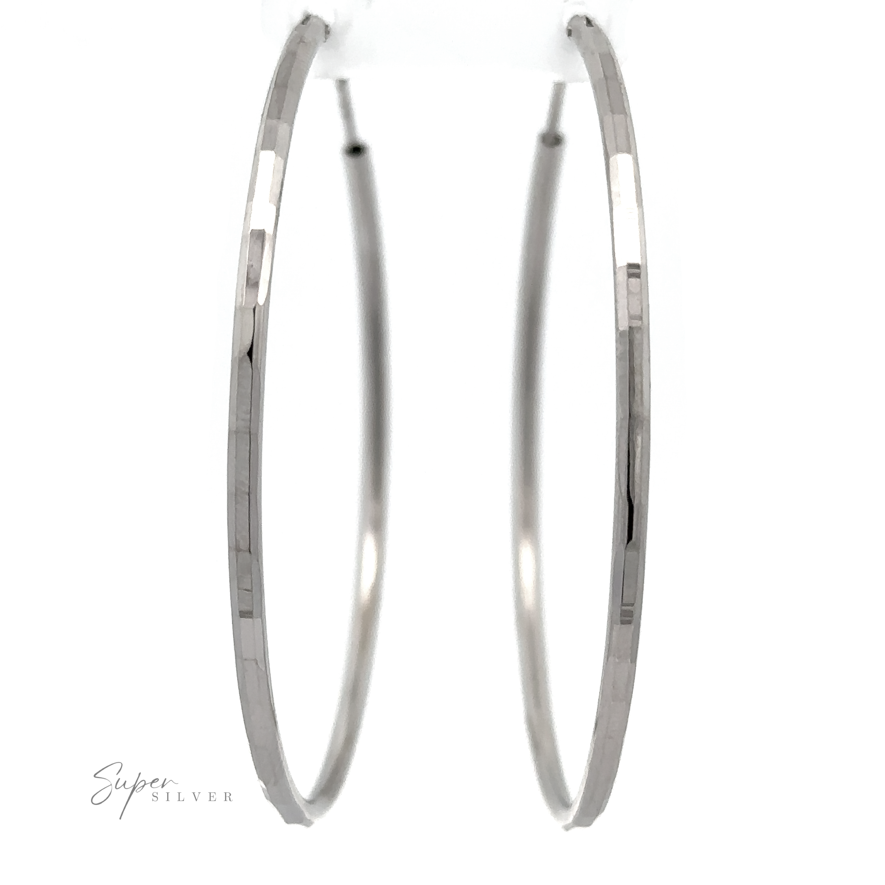 2mm Diamond Cut Hoop Earrings with a thin, slightly angular design, crafted from .925 sterling silver, presented on a white background with a reflective surface below and a "super silver" signature.