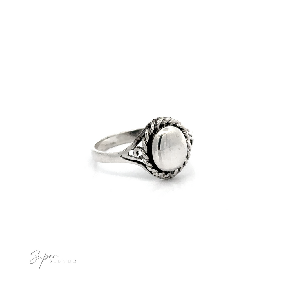
                  
                    A Silver Ring With Oval Design With A Rope Border and a white stone in the middle.
                  
                