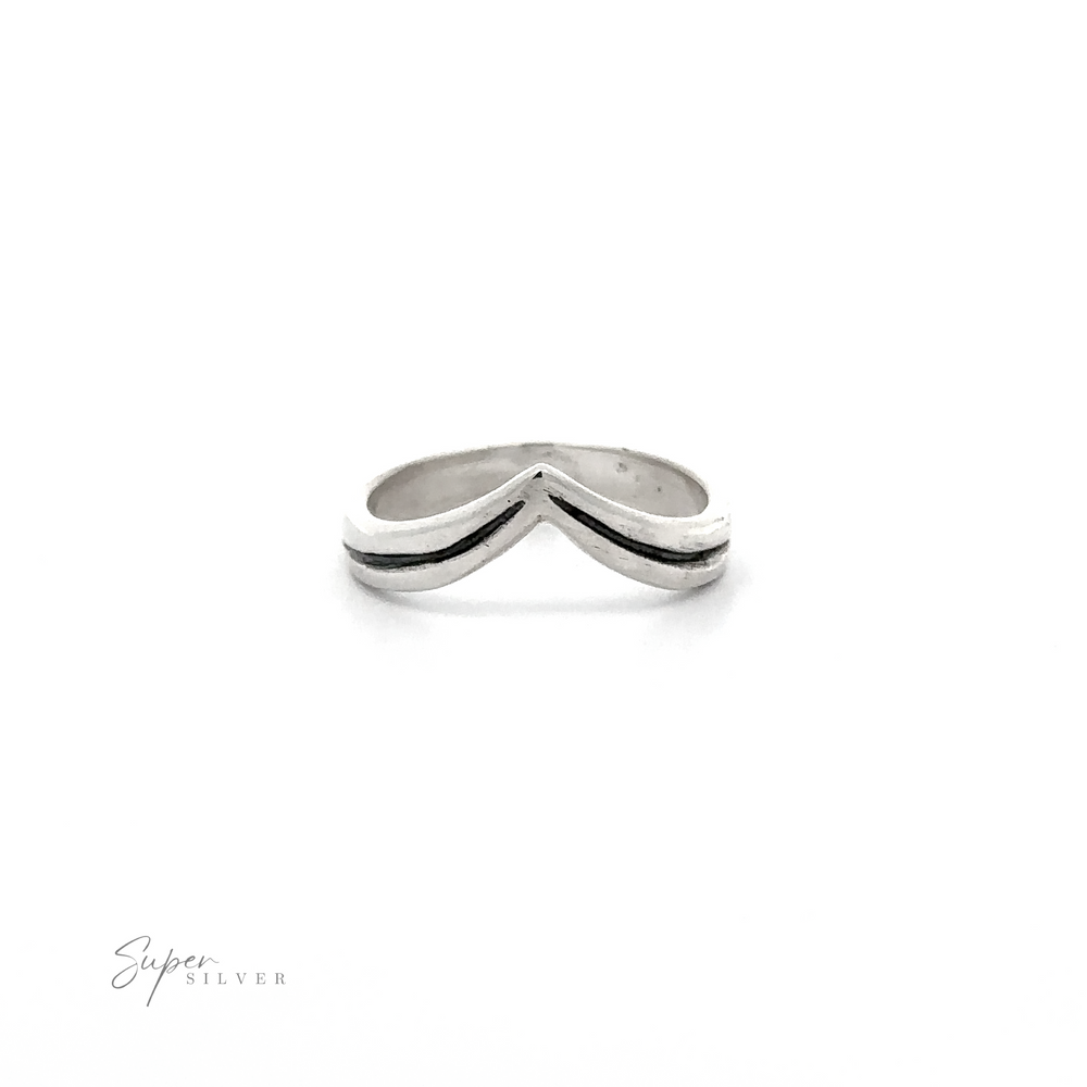 
                  
                    An oxidized sterling silver Simple Chevron Ring with black lines on the band.
                  
                