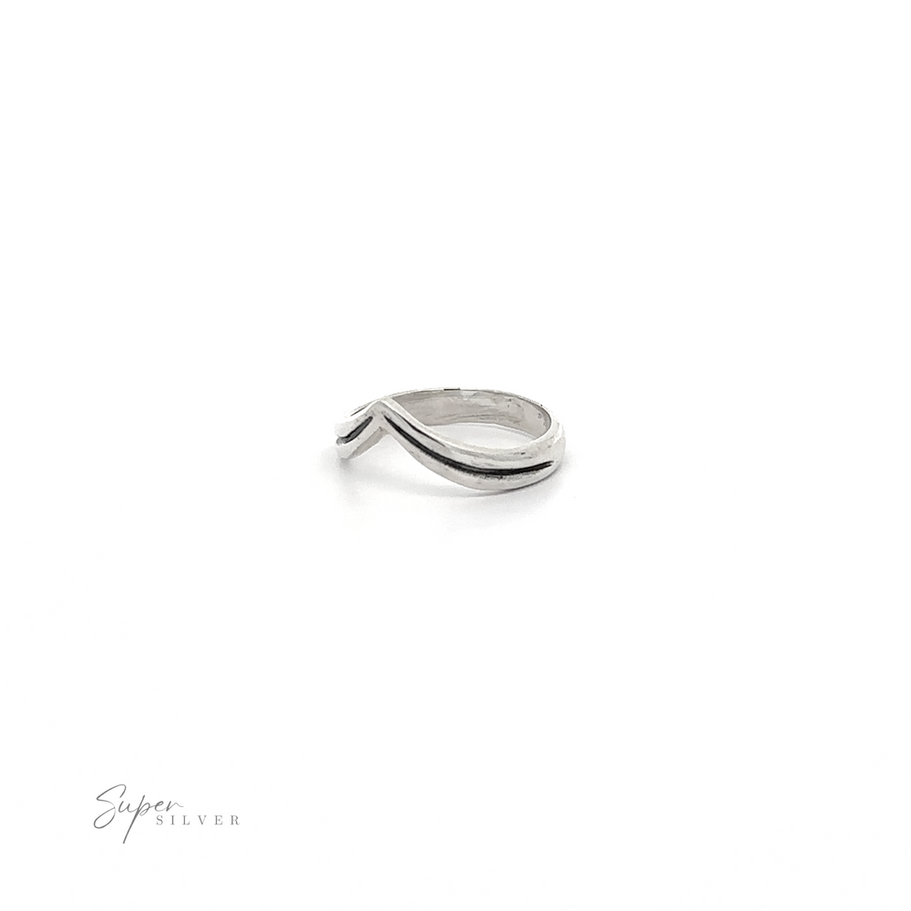 
                  
                    An oxidized sterling silver Simple Chevron Ring with a curved edge and chevron band.
                  
                