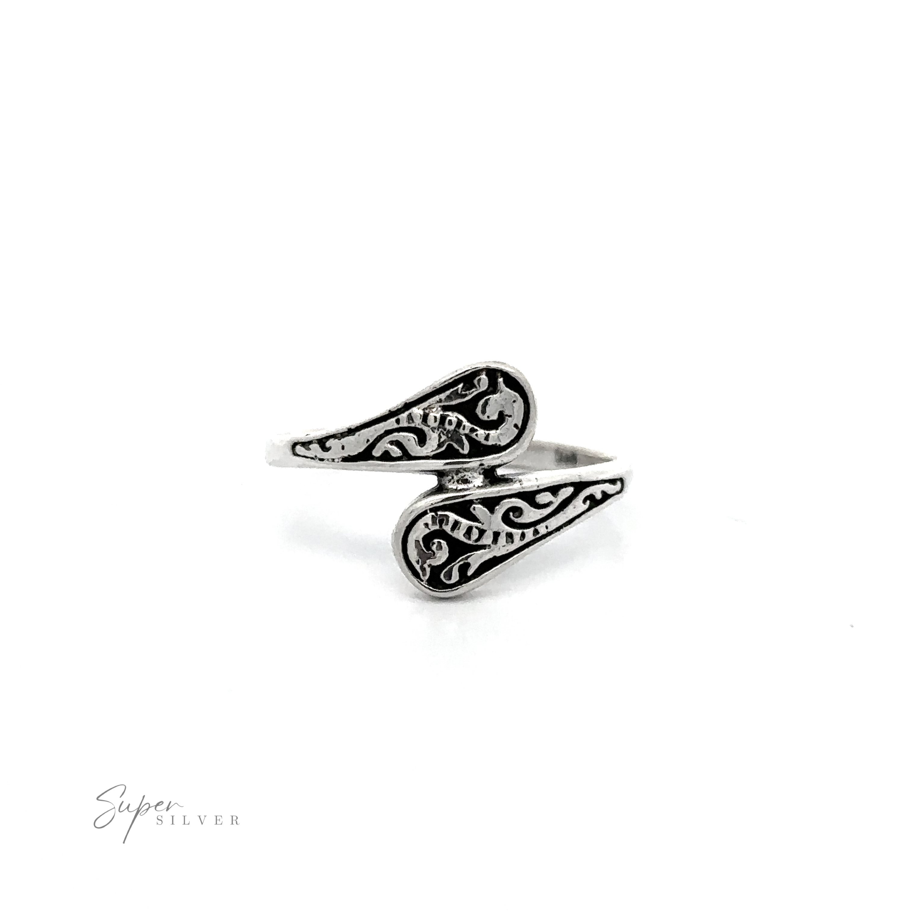 An oxidized finish sterling silver Dainty Spoon Ring with a swirl design.
