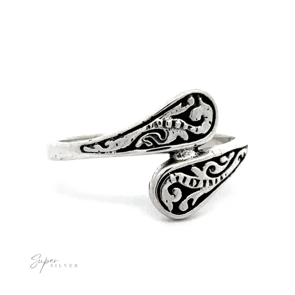 A Dainty Spoon Ring with a swirl design.