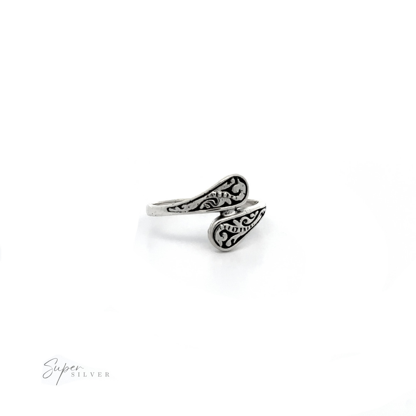 
                  
                    A Dainty Spoon Ring with an ornate swirl design.
                  
                