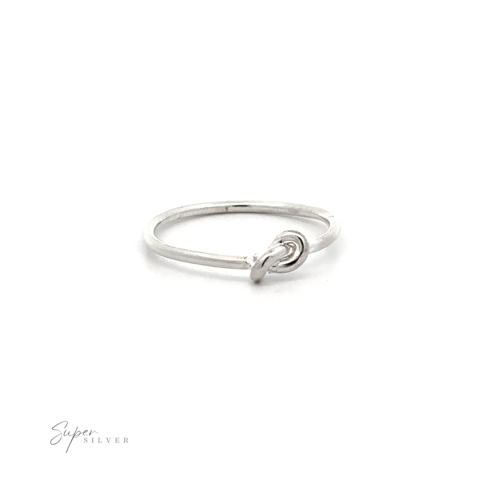 
                  
                    A simple and sweet Tiny "Love" Knot Ring made of .925 Sterling Silver.
                  
                