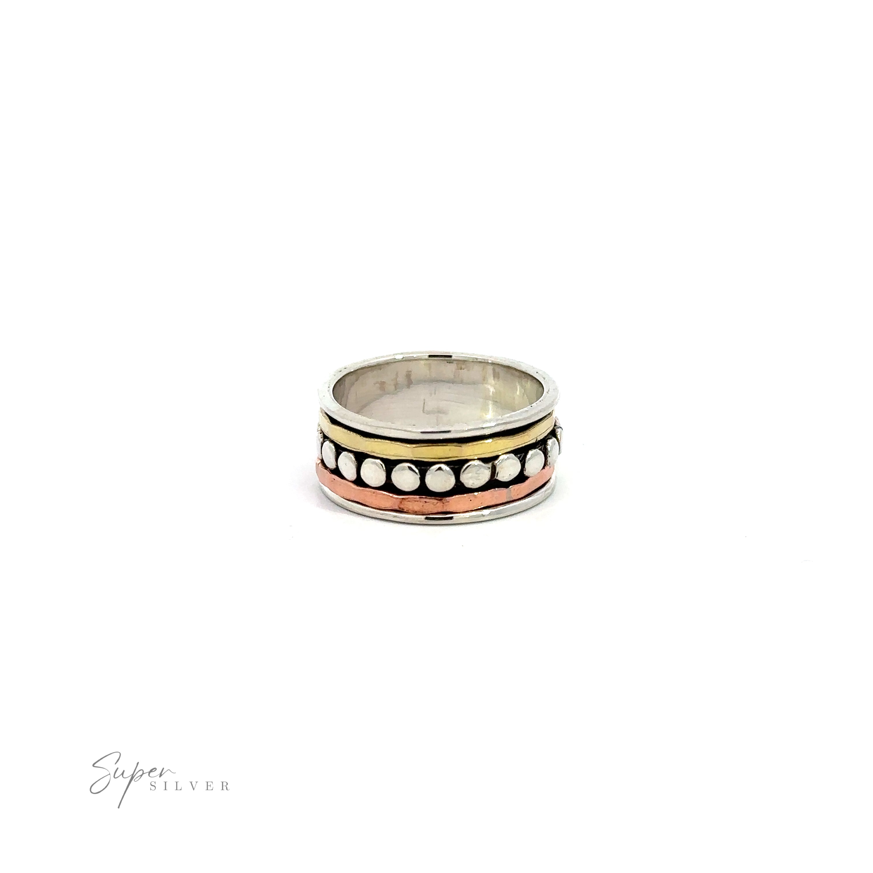A Tricolor Handmade Spinner Ring with Dots from our mixed metal bands jewelry collection, featuring a combination of silver and gold with white and black beads.