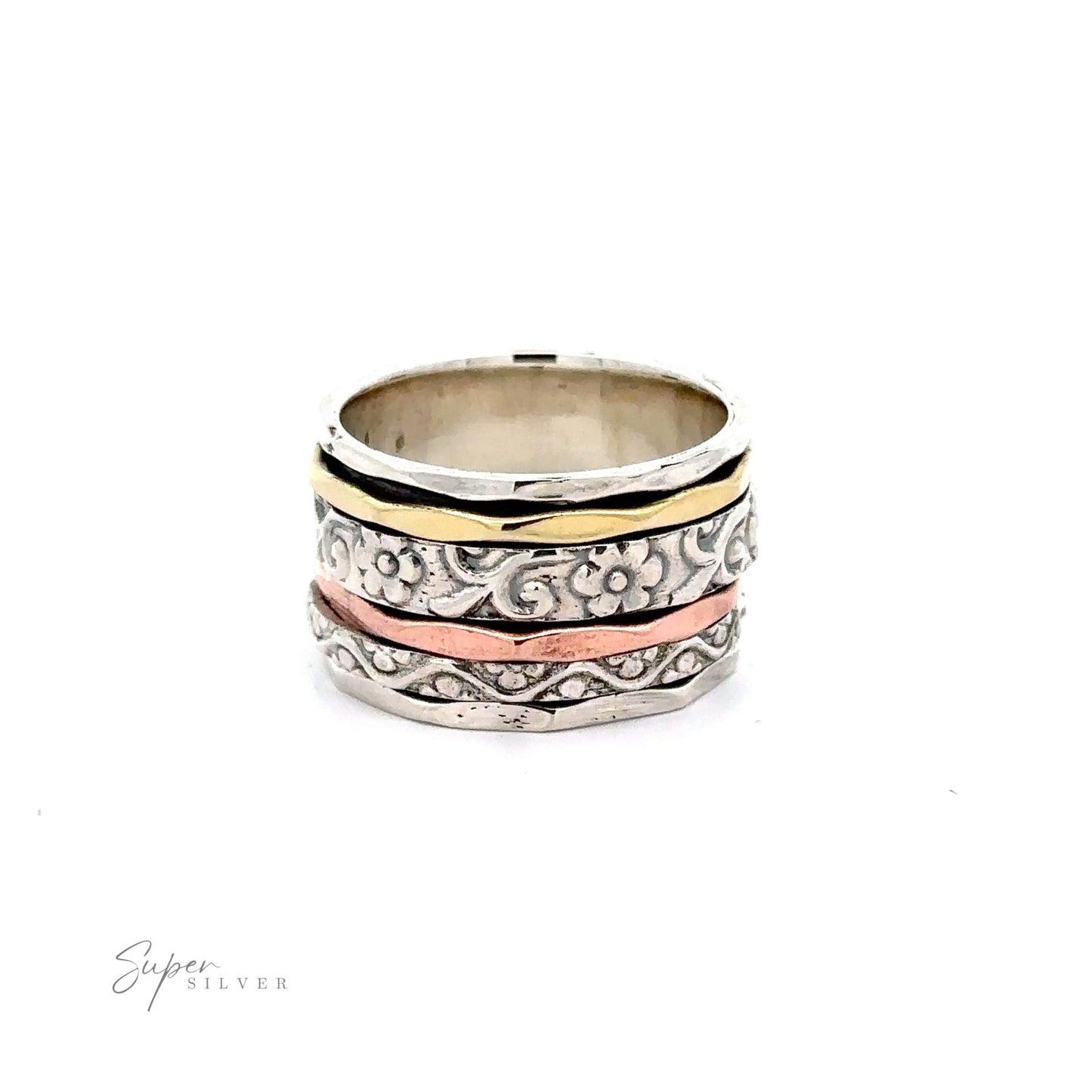 A Handmade Spinner Band with Flower Etching with an etched floral pattern on silver and gold bands.