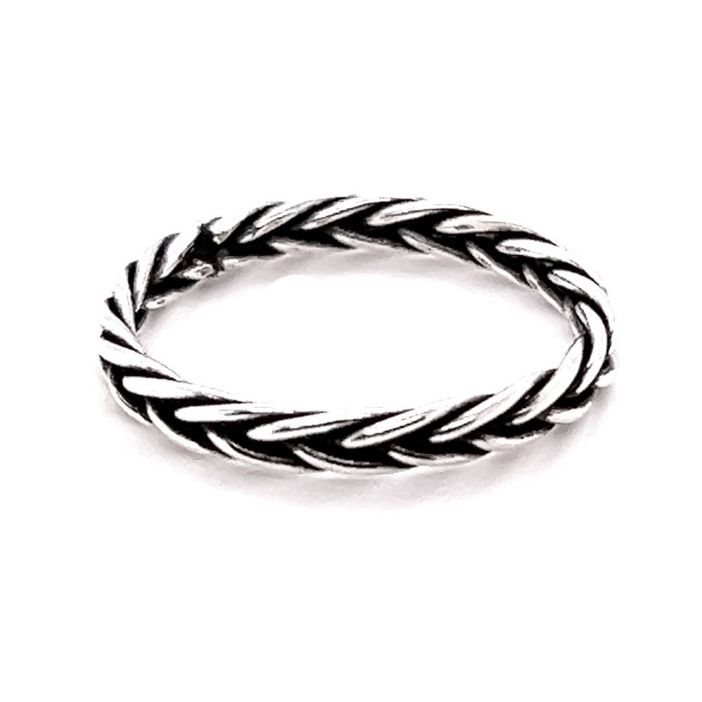 
                  
                    A minimal Double Braided Band Ring with an earthy twist on a white background.
                  
                