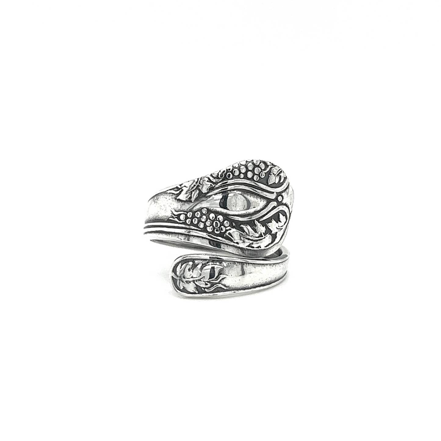 
                  
                    A Timeless Spoon Ring with an ornate old-world design on it.
                  
                