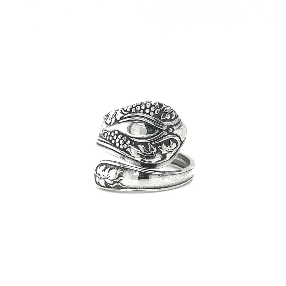 
                  
                    A Timeless Spoon Rings silver ring with a snake on it.
                  
                