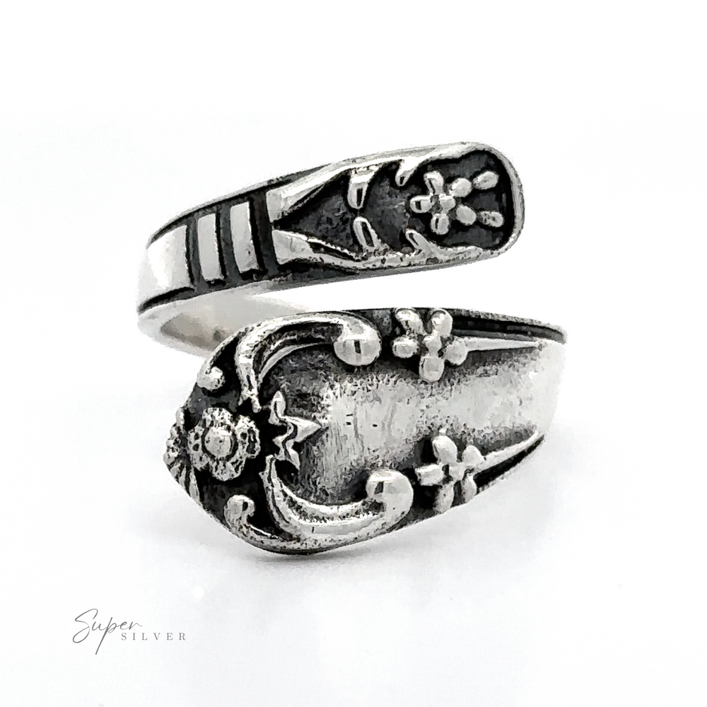 
                  
                    An adjustable silver Spoon Design Ring, crafted in .925 sterling silver.
                  
                