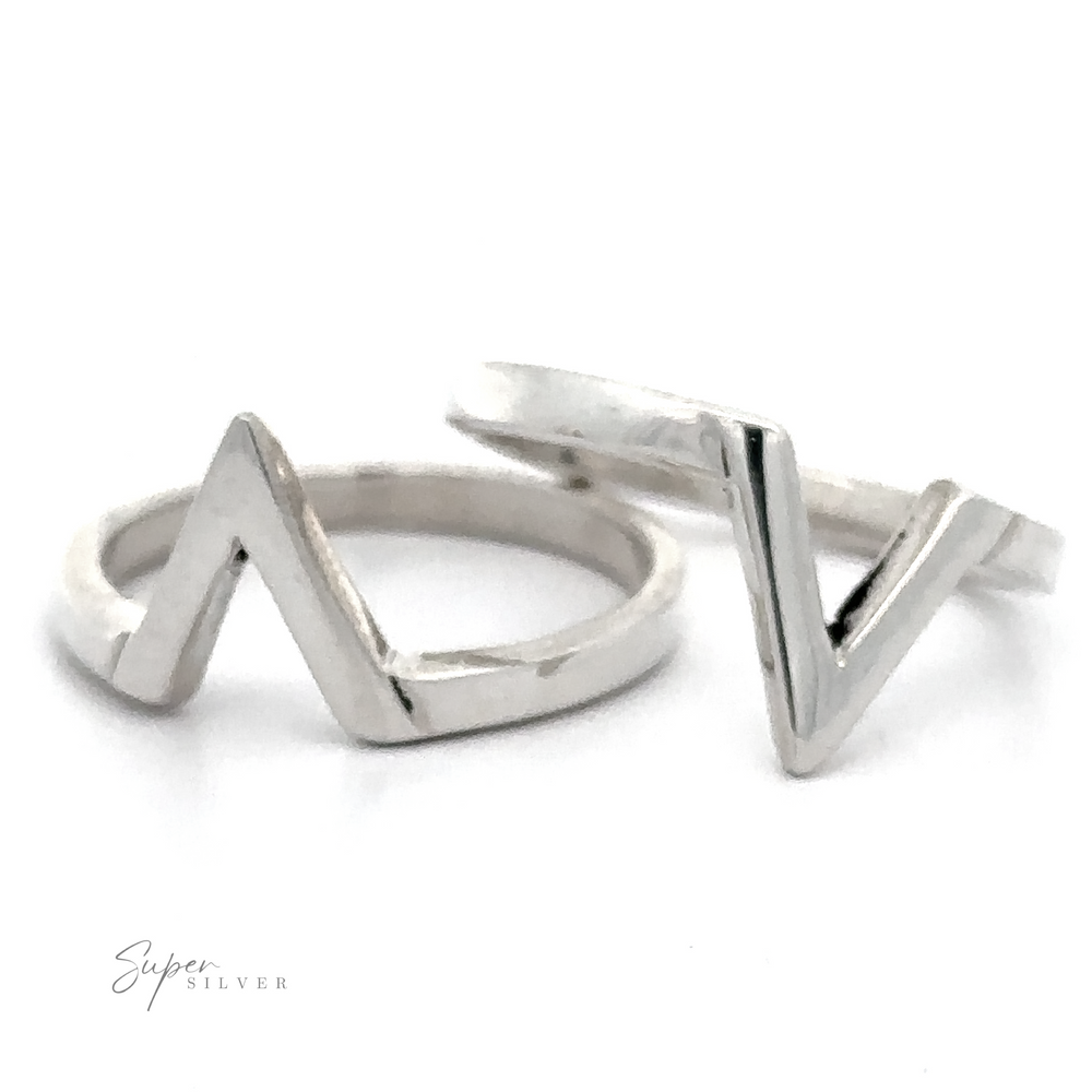 A pair of sterling silver Simple "V" Shape Rings.