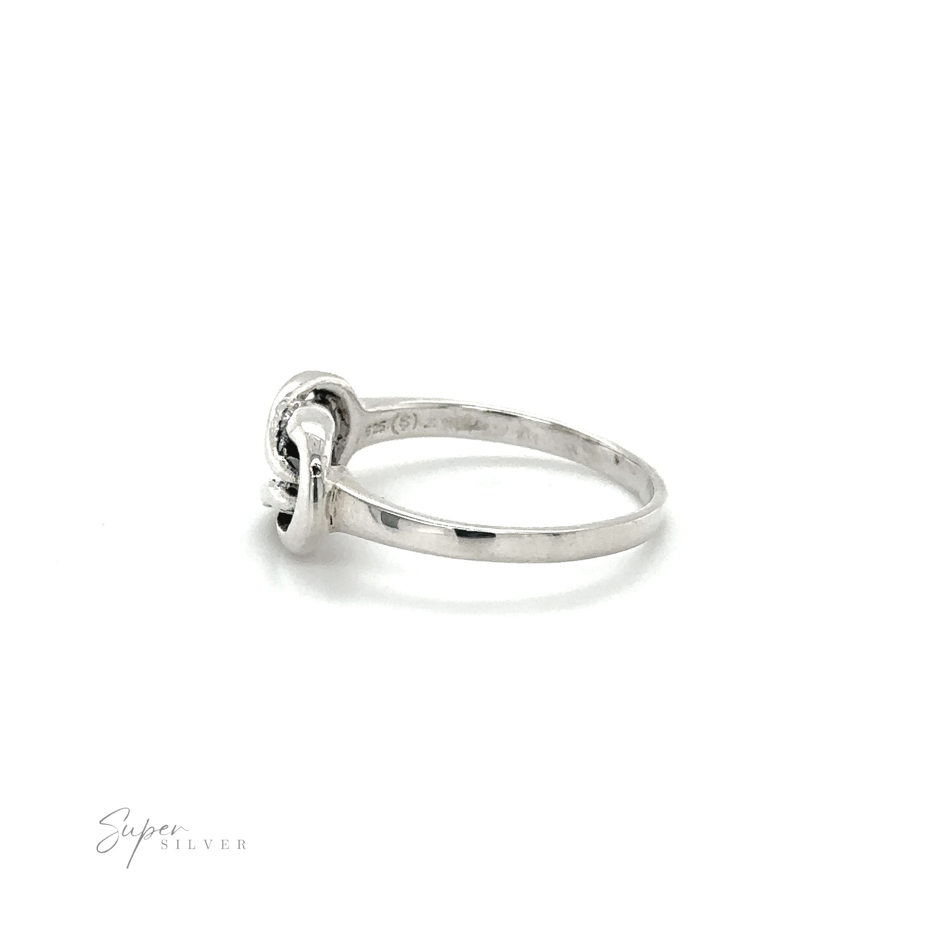 A Solid Knot Ring with a powerful diamond in the center.