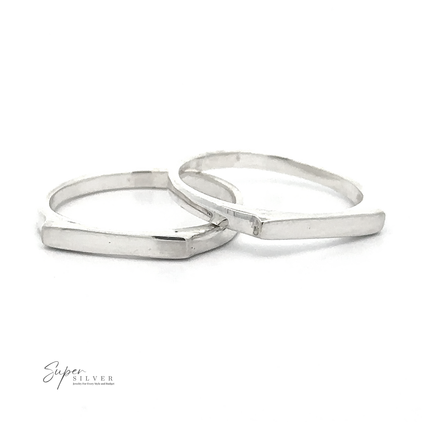 Two Dainty Silver Bar Rings with a geometric design are displayed against a white background. Embracing modern minimalism, the logo "Super Silver" is seen in the lower left corner.