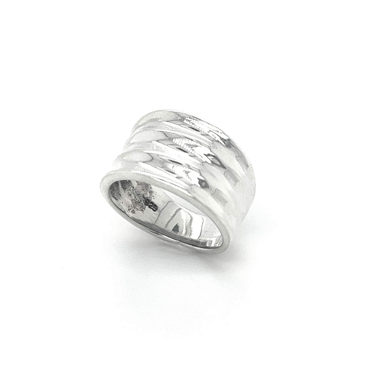 
                  
                    A fashion-forward Super Silver Wide Tapered Band ring with a hammered pattern.
                  
                