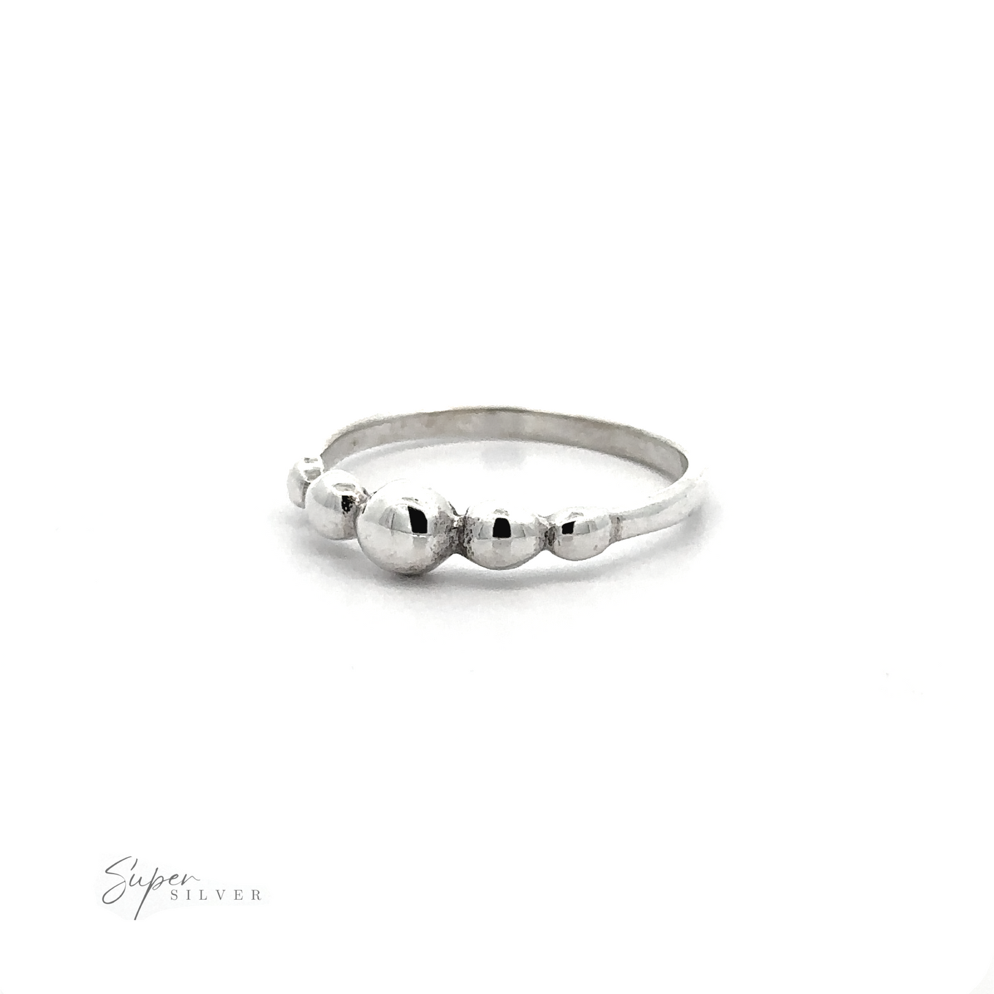 
                  
                    A modern Dainty Graduated Silver Ball Ring with a tactile experience.
                  
                