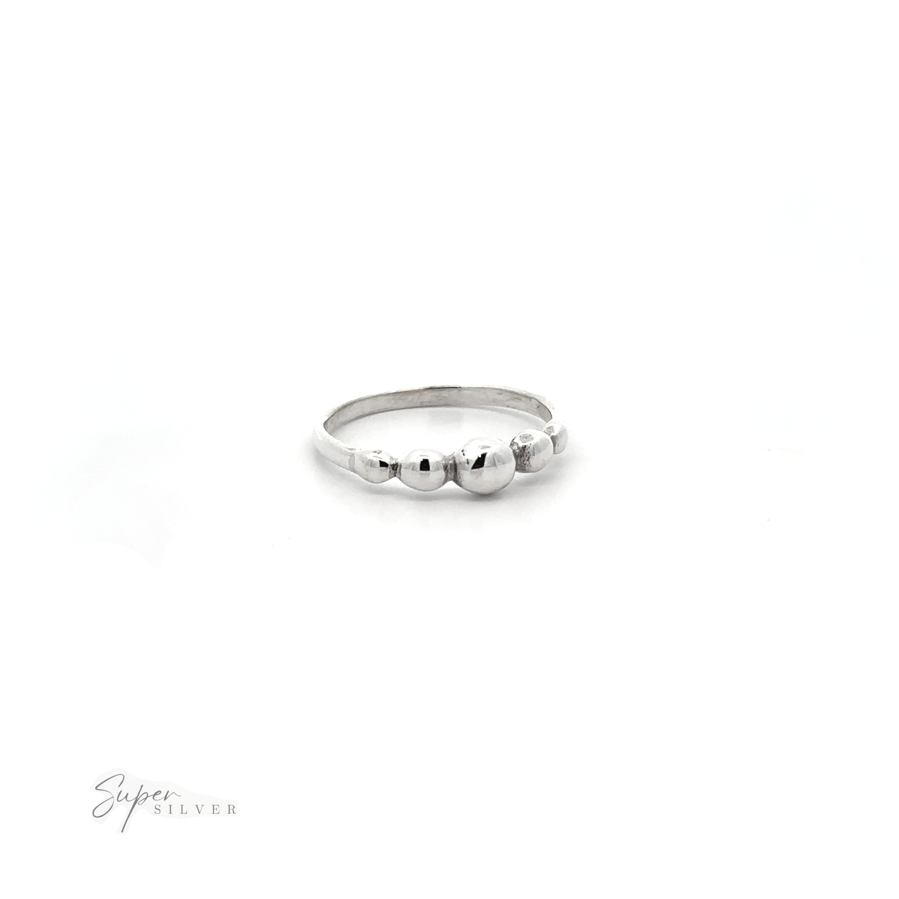 A modern design Dainty Graduated Silver Ball Ring adorned with three graduated balls.