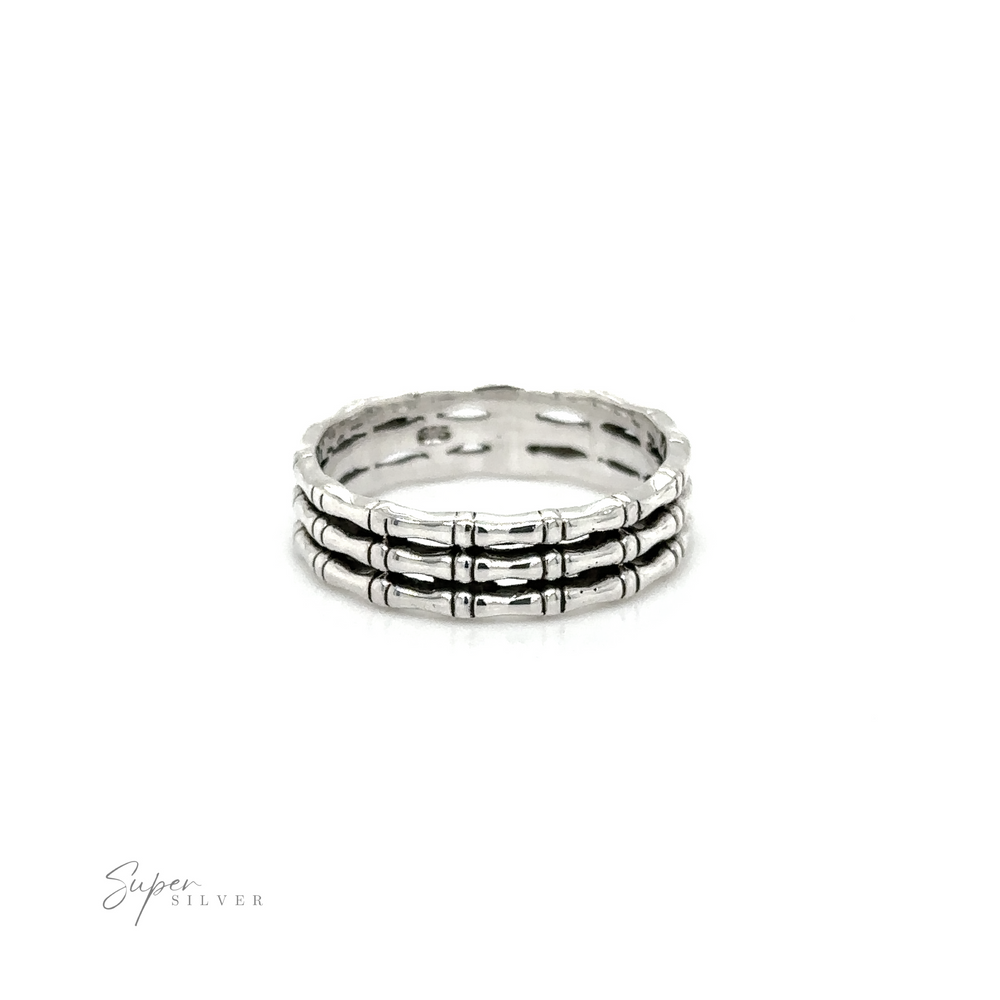 A minimalist style, Triple Bamboo Band Ring with black and white stripes by Super Silver.