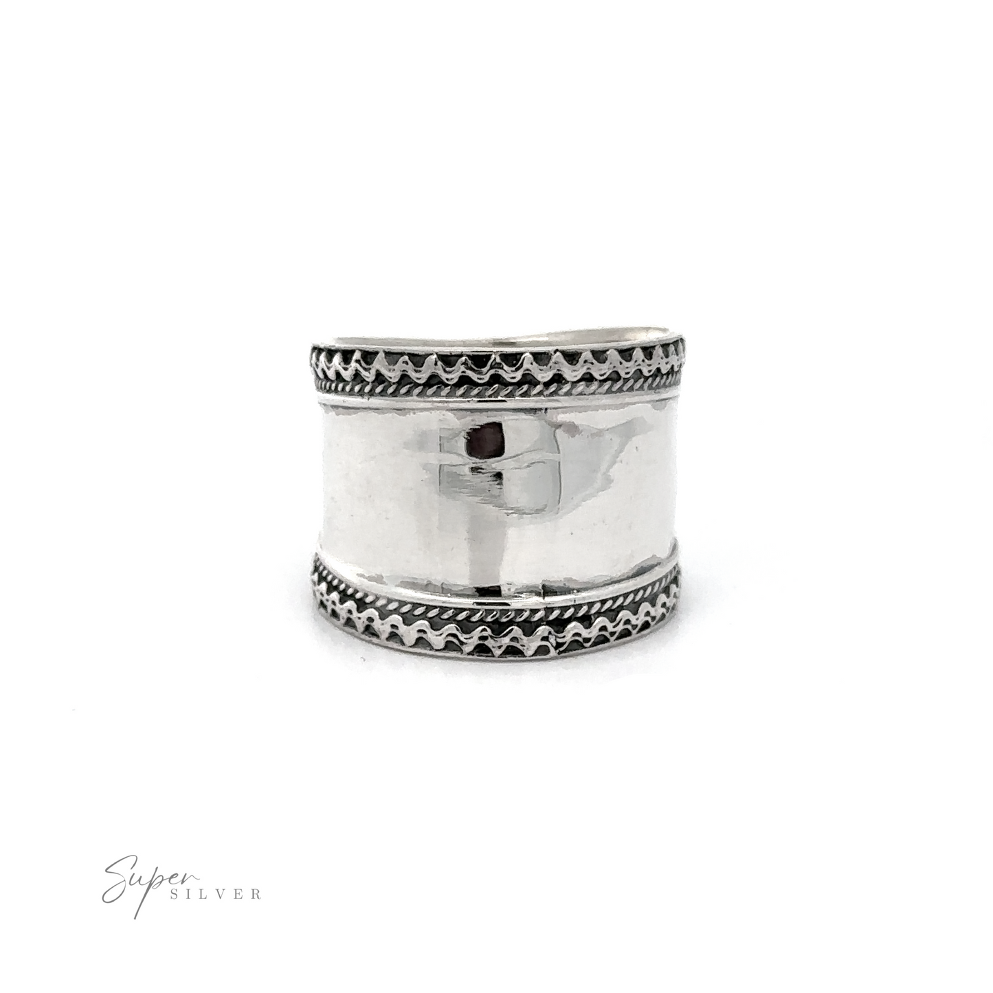 A Wide Silver Band with Etched Border with a rope pattern on it.
