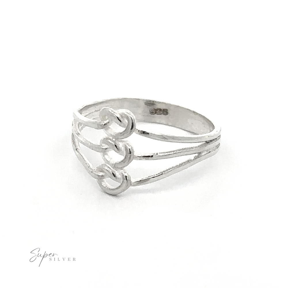 A Funky Silver Knotted Ring with three knots representing unity and connection.