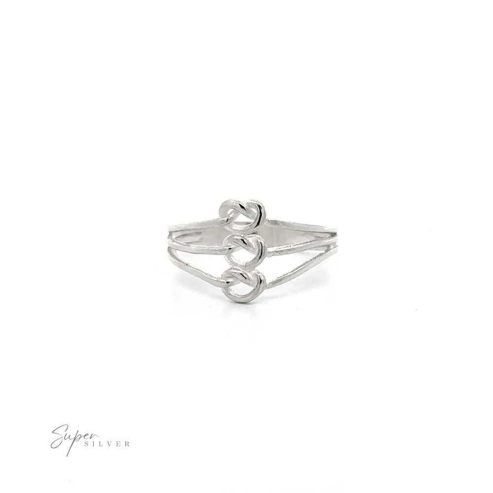 
                  
                    A Funky Silver Knotted Ring with a heart shaped design featuring a whimsical and unparalleled design.
                  
                