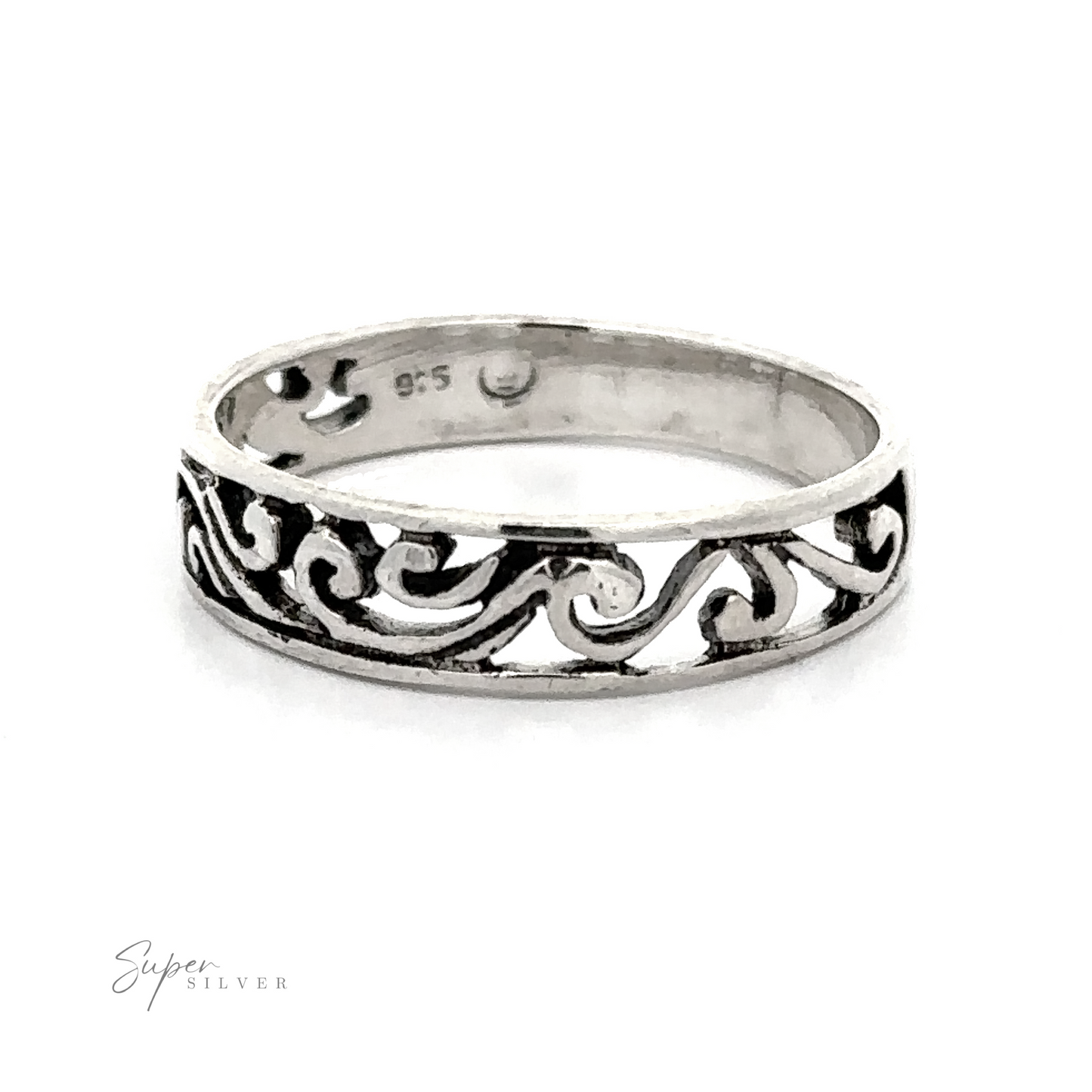 A Beautiful Open Filigree Band with a swirl and filigree design.