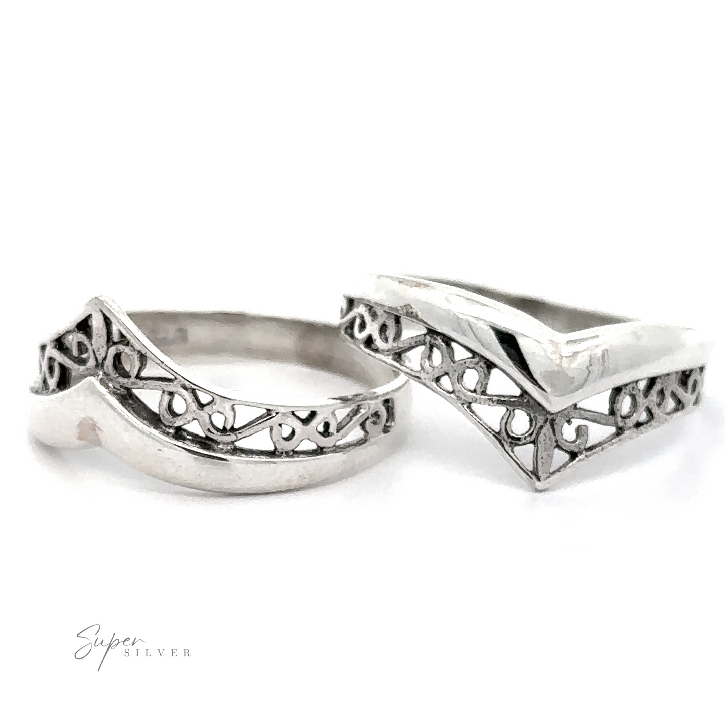 Two Filigree Chevron Rings with intricate designs on them, combining unique looks and a touch of victorian charm.