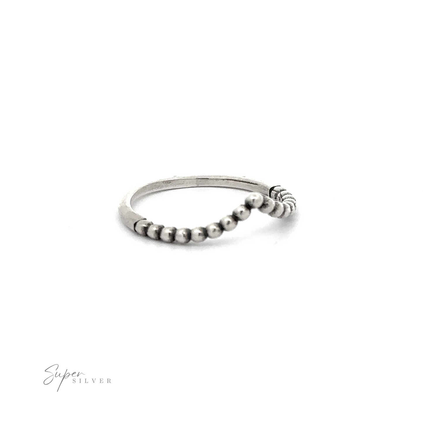 
                  
                    An oxidized sterling silver beaded chevron ring adorned with beads.
                  
                