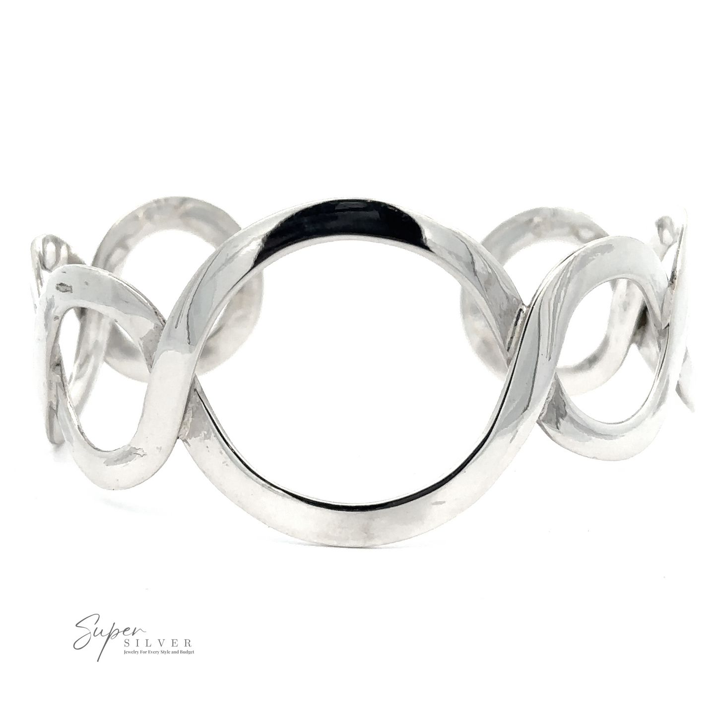 
                  
                    A Twisted Graduated Circle Cuff featuring an overlapping loop design and a unique graduated circle pattern as its central accent. The brand logo, "Super Silver," is visible in the lower left corner.
                  
                