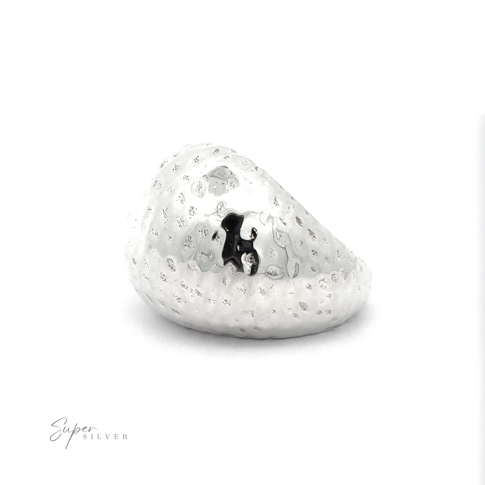 
                  
                    A Statement Hammered Ring with a black and white pattern, crafted in silver.
                  
                