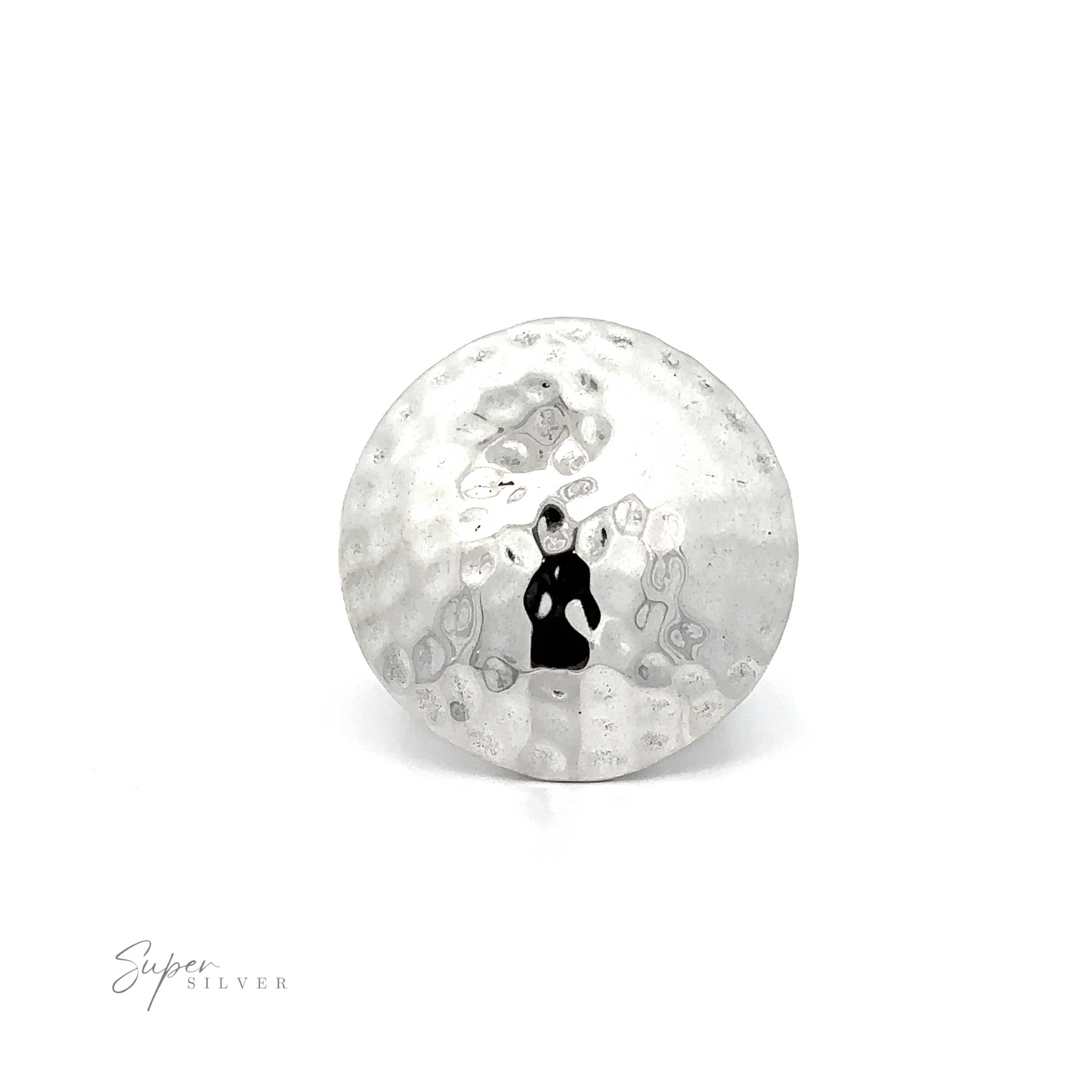 
                  
                    A silver golf ball with a silhouette of a woman, showcasing boldness from the Statement Hammered Rings collection.
                  
                