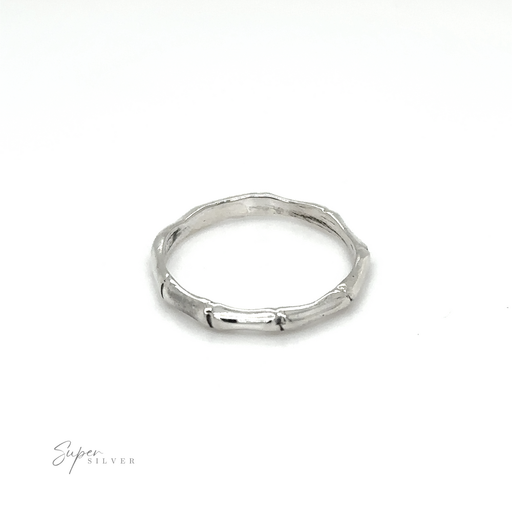 A Super Silver Bamboo Band Silver Ring with a bamboo design.