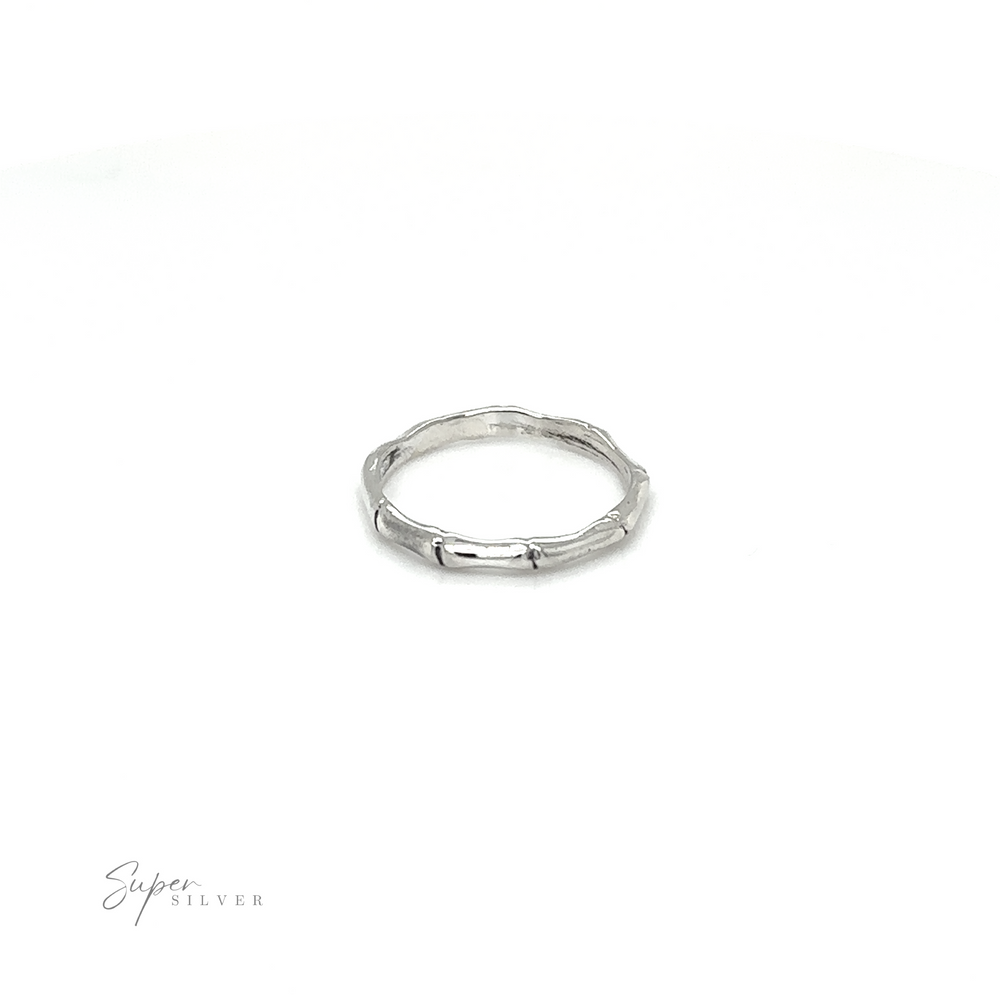 
                  
                    A Super Silver Bamboo Band Silver Ring with a simple design on a white background.
                  
                