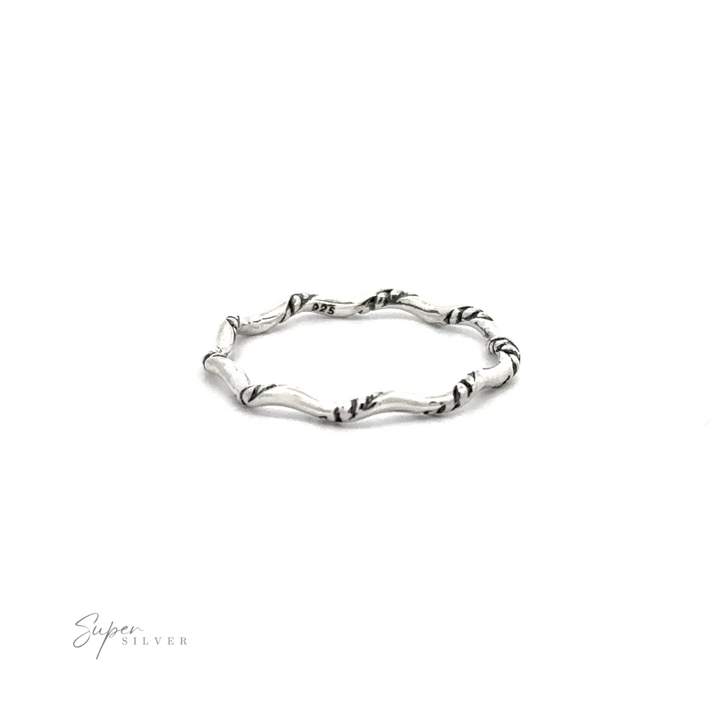 A Sterling Silver Wavy Rope Band with an oxidized finish on a white background.