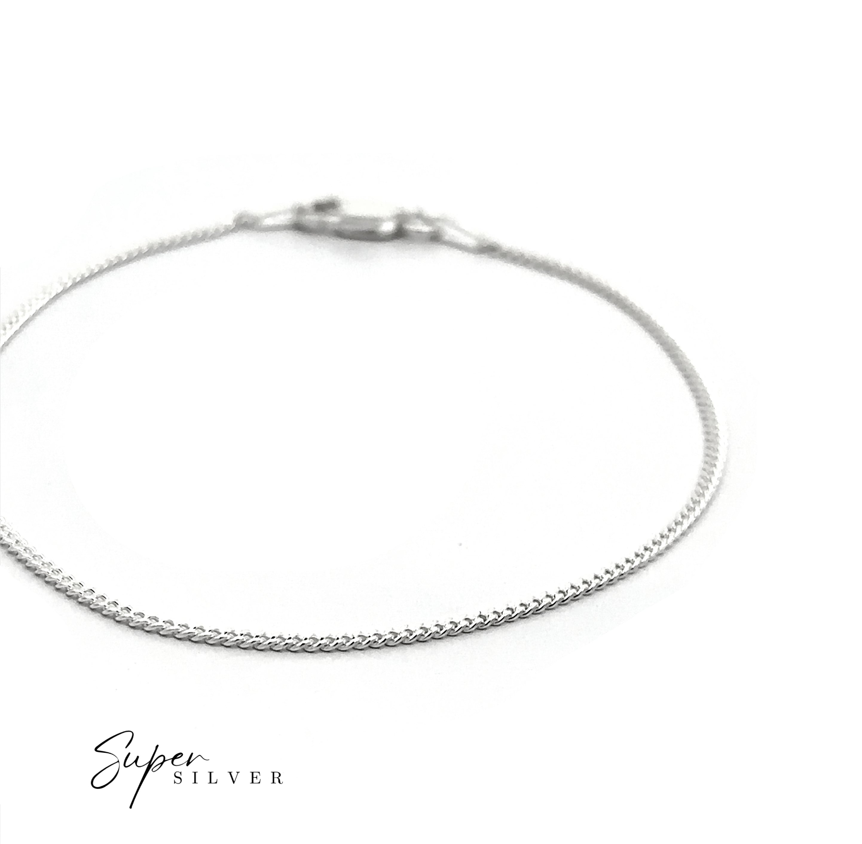 A Thin Italian Curb Chain sterling silver bracelet with a clasp is shown on a white background. "Super Silver" appears in the bottom left corner.