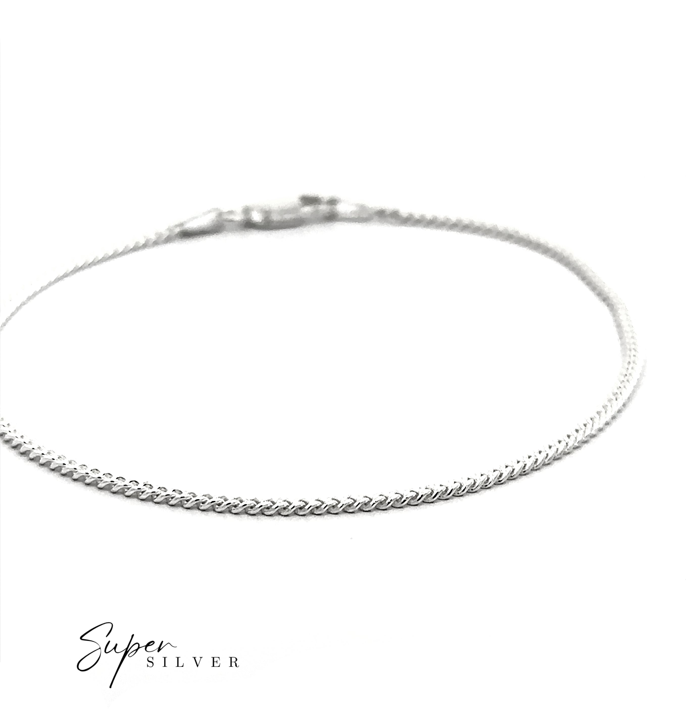 The Thin Italian Curb Chain, a sterling silver bracelet with a clasp, is displayed on a white background. "Super Silver" is written in the bottom left corner.