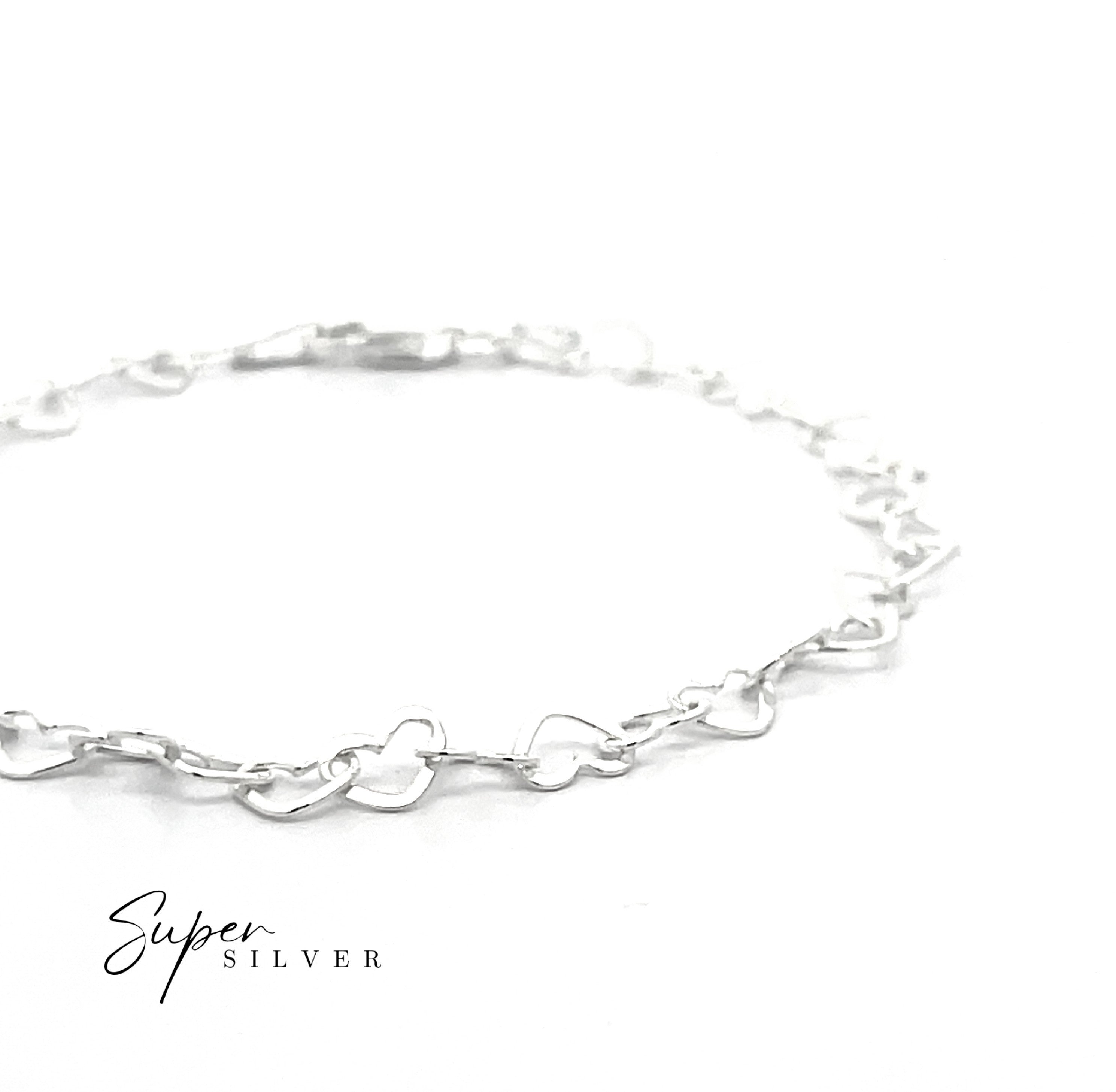 The Italian Heart Link Chain, crafted in sterling silver with delicate heart-shaped links, is shown on a white background with "Super Silver" in the lower left corner.