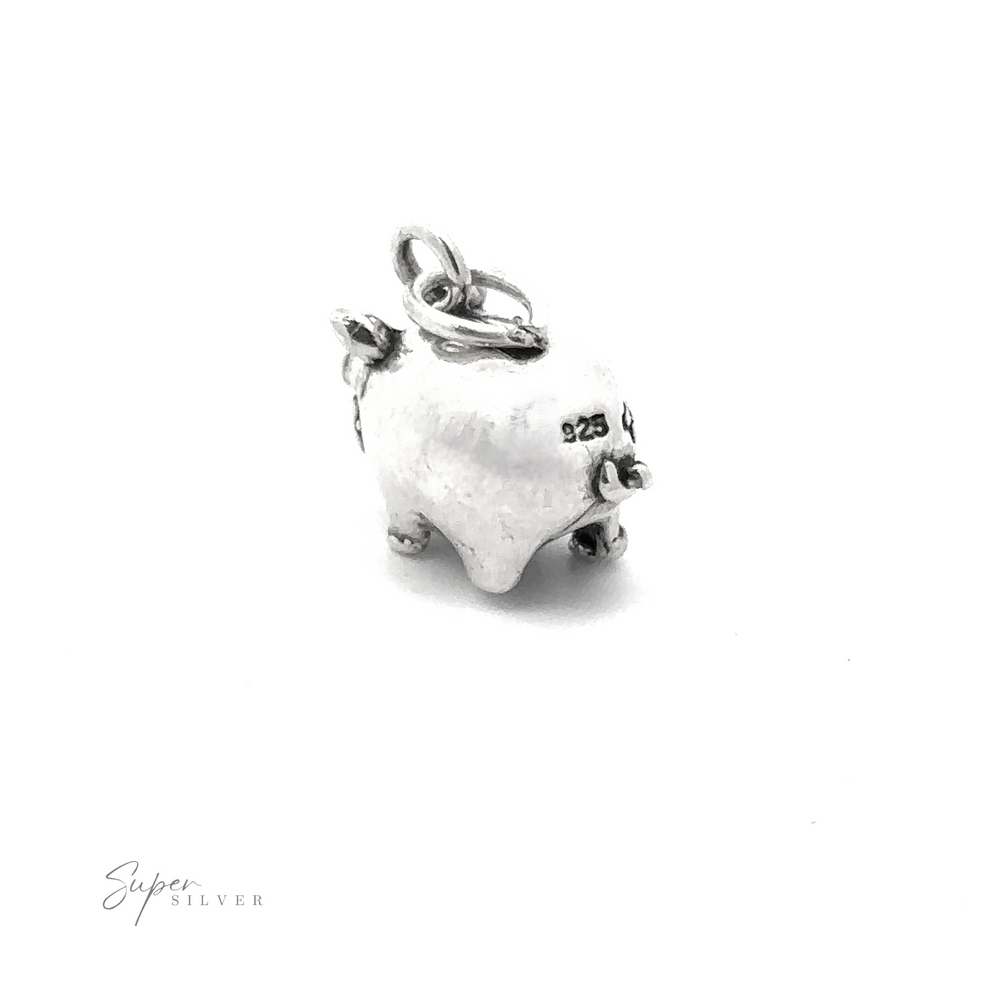 
                  
                    The Piggy Bank Charm is a small, chunky silver charm designed in the shape of a pig, complete with a loop for easy attachment. Made from high-quality .925 Sterling Silver, this playful piece of jewelry stands out against its plain white background.
                  
                