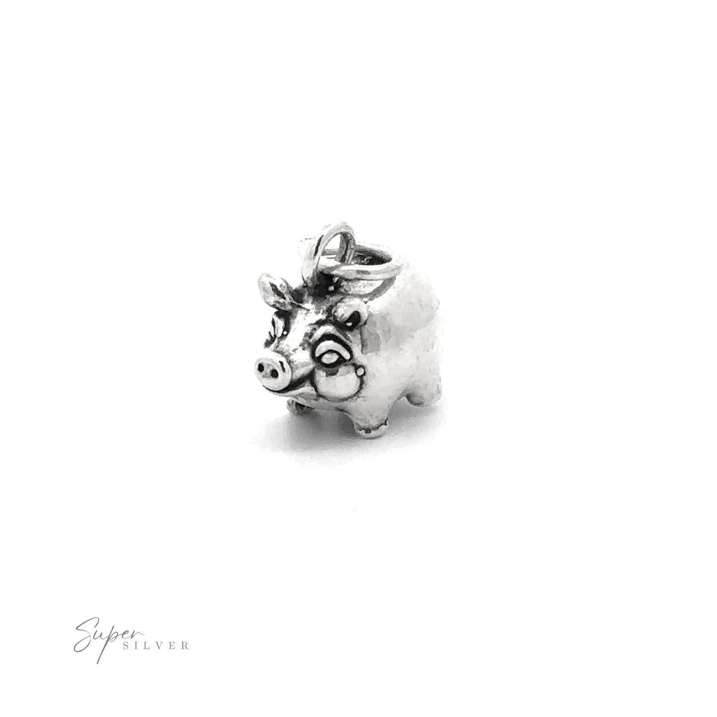 
                  
                    The Piggy Bank Charm is a small, playful jewelry piece crafted in .925 Sterling Silver, featuring detailed eyes and a snout. It has a loop on top for attaching to a chain or bracelet, with the text "Super Silver" visible in the bottom left corner to denote its high-quality silver.
                  
                